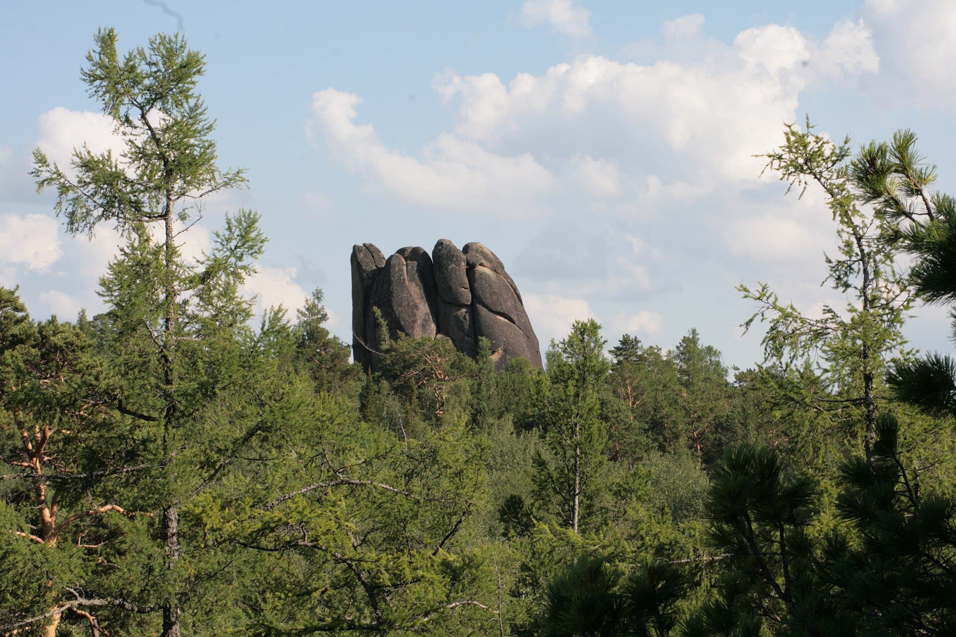 Syenite pillars of the Krasnoyarsk Stolby rising out of the taiga, Eastern Sayan foothills, Siberia
