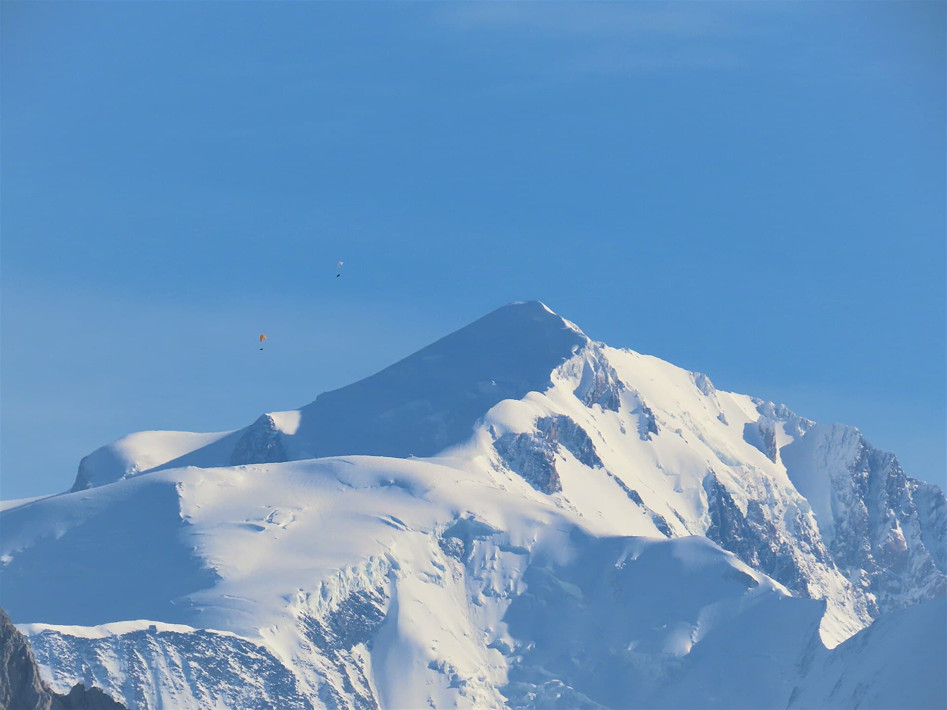 The snow dome of Mont Blanc seen from the Roc des Tours